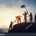 stock-photo-silhouette-of-business-man-on-mountain-and-sunset-background-business-teamwork-success-concept-735308308 stock-photo-silhouette-of-business-man-on-mountain-and-sunset-background-business-teamwork-success-concept-735308308